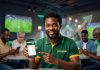 Man checking a sports betting app on his phone